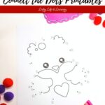 A page from the Valentine’s Day Connect the Dots Printables on a table
