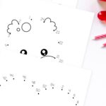 Three Valentine’s Day Connect the Dots Printables on a table