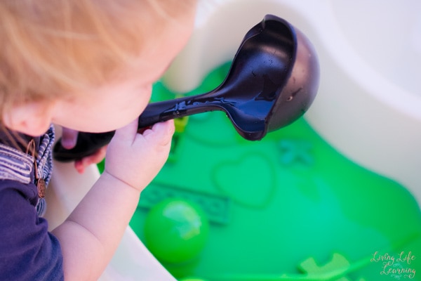 Simple water play for kids: My toddler had great fun with this monochromatic green sensory soup - and he learned a little something about the color green at the same time!
