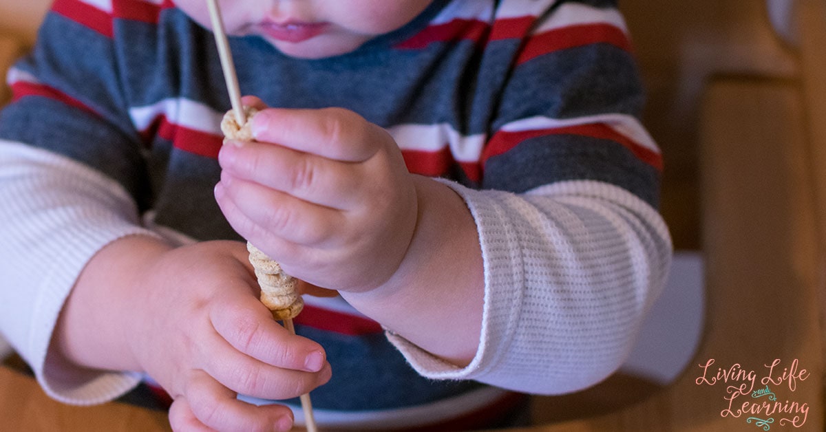 Looking for a fun, engaging, and simple way to work on your toddlers fine motor skills? Try this Cheerios Fine Motor Snack! My son thought it was amazing :)