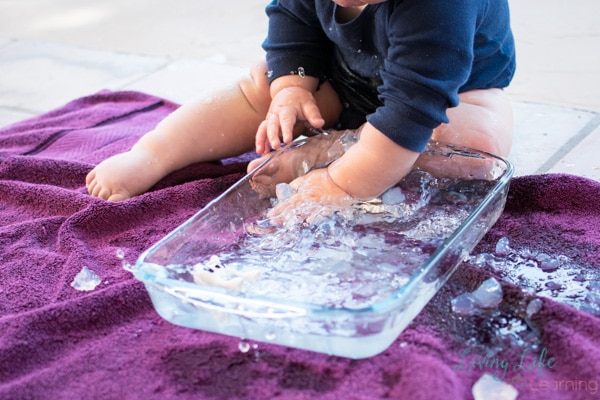 Babies love simple sensory play! Baby play with gelatin and water was loads of fun for my son and not very messy!