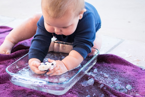 Babies love simple sensory play! Baby play with gelatin and water was loads of fun for my son and not very messy!