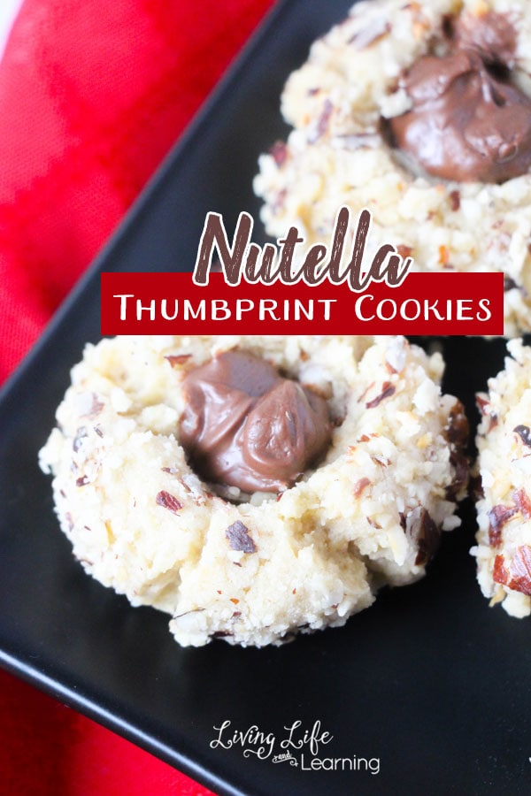 We love simple, yummy and quick snacks to make with the kids. They love to help me make snacks that we can all enjoy right after. This Nutella Thumbprint Cookies recipe is the perfect one!