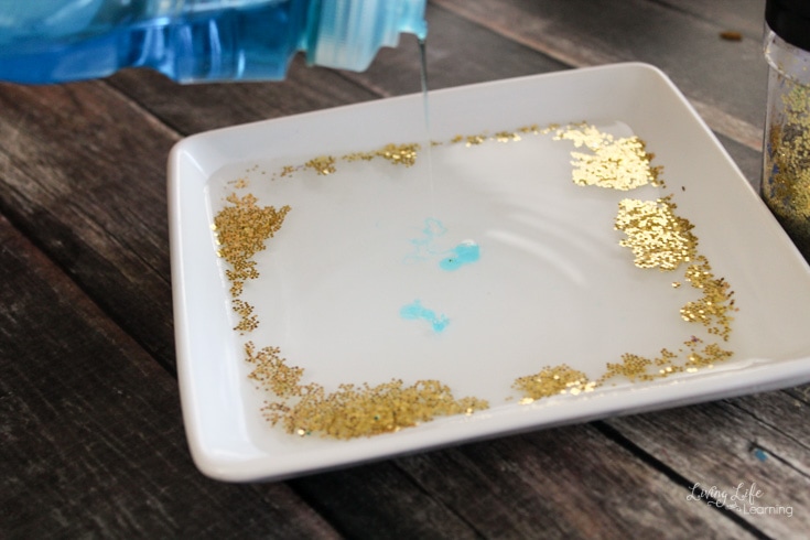 Glitter germ experiment to show the importance of using soap to clean your hands