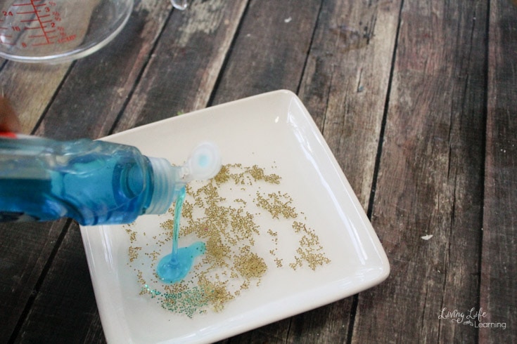 add soap to your glitter germ scienc experiment