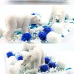 Easy Polar Bear Sensory Bin: 2 polar bear toys are inside a bin with faux snow