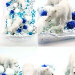 Easy Polar Bear Sensory Bin: 2 polar bear toys are inside a bin with faux snow