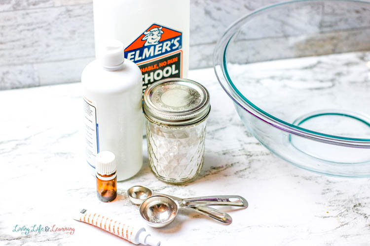 The ingredients for the wild orange cream slime recipe are glue, water, baking soda and contact lens solution.