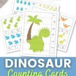 dinosaur counting cards and puzzles on a table