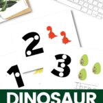 Dinosaur Counting Mats on a computer table
