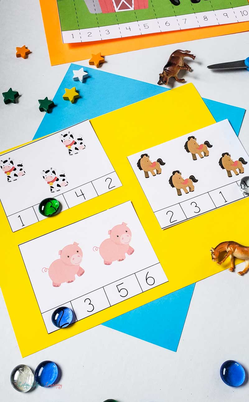 Farm counting cards with glass beads on the answers