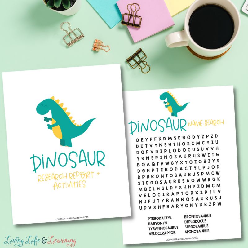 There are two pages on a mint green table. One page says dinosaur research report activities on it and the other is a name search all about dinosaurs.