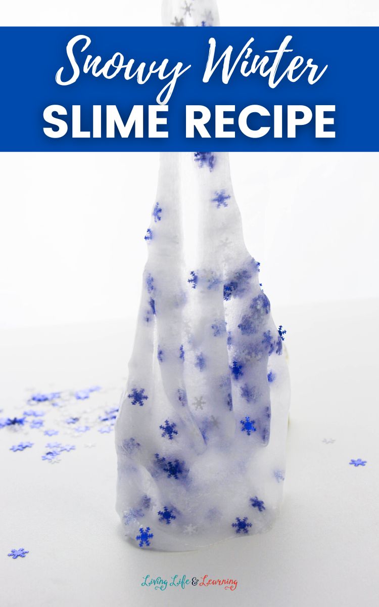 This image shows Slime that is winter themed. The slime has blue snowflakes and is being pulled upwards