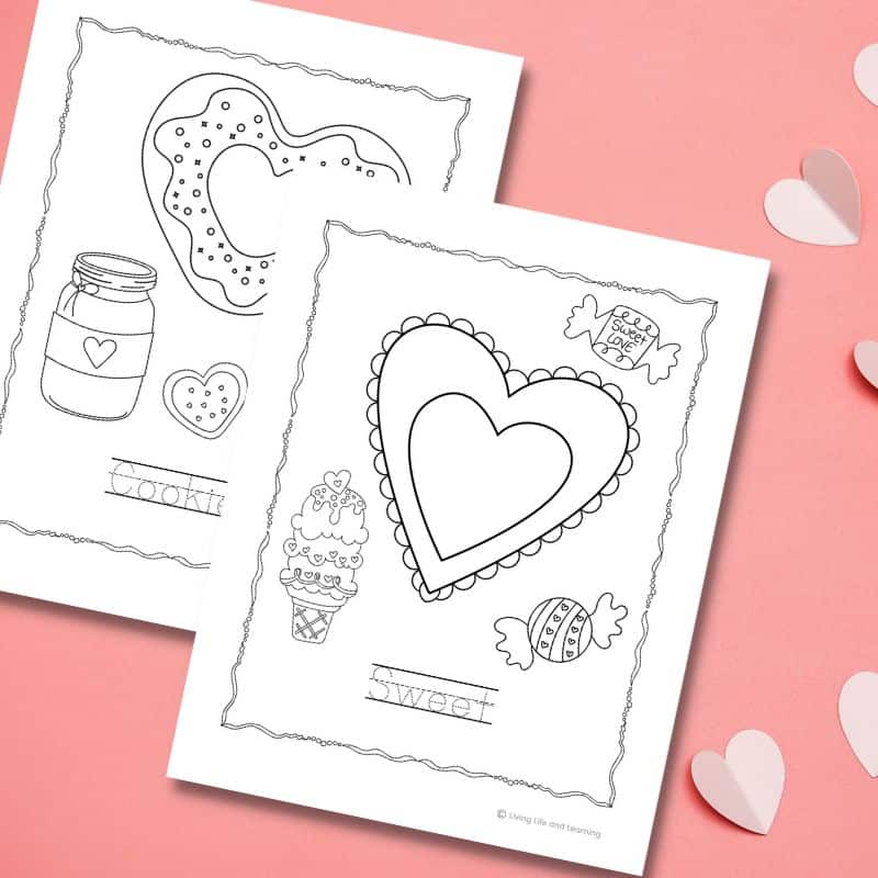 There are two Heart Coloring Pages placed on the table.