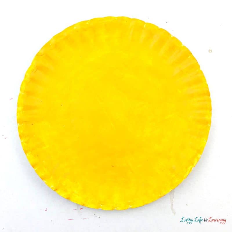 Chicken Paper Plate Craft paper plate painted yellow.