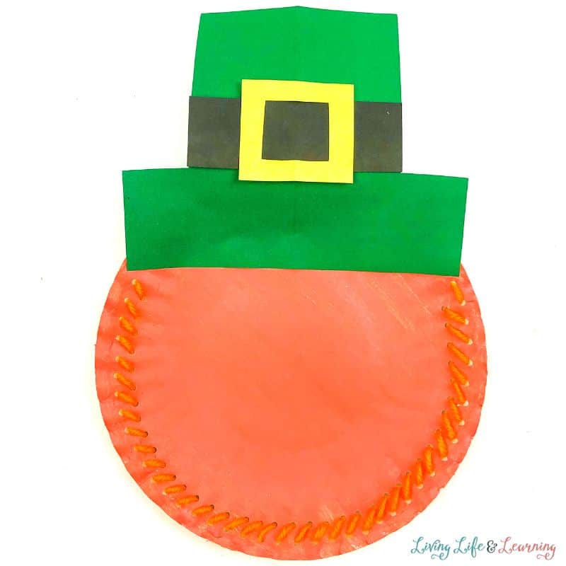 An image of a leprechaun paper plate craft without the face features added.