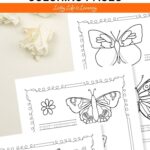 Three Butterfly Coloring Pages on a table