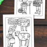 Two Farm Coloring Pages on a table