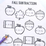 Fall Math Worksheets on a table