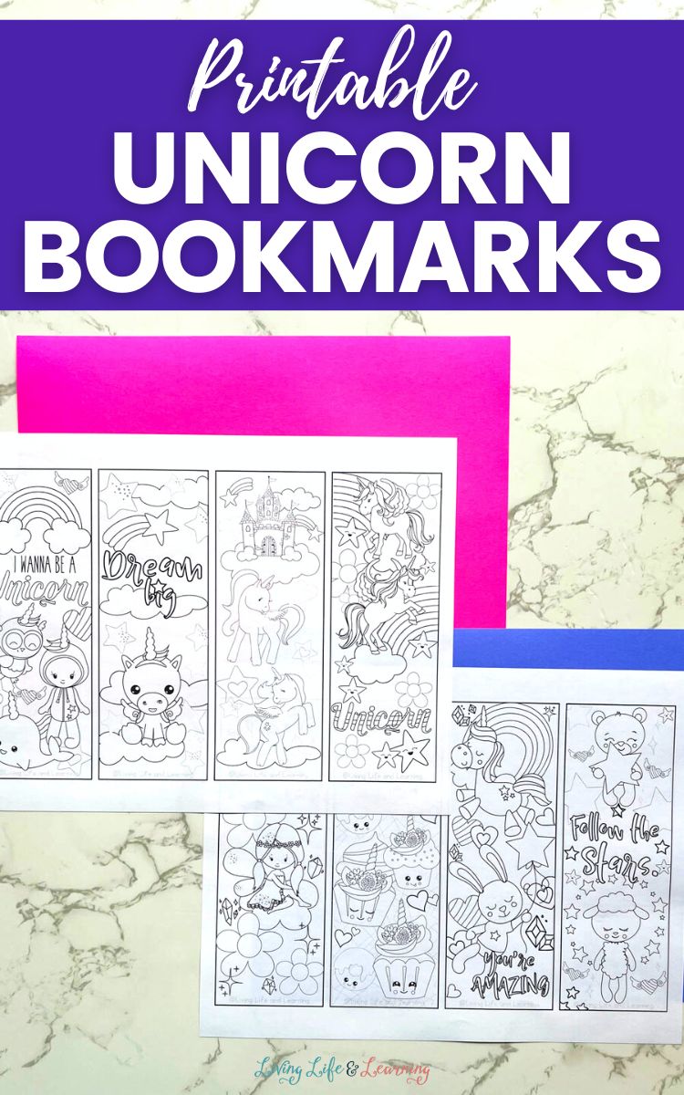 Eight uncut Printable Unicorn Bookmarks on a table