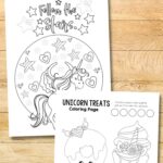 Two Unicorn Coloring Pages on a table