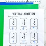 A Winter Addition Worksheet for Kindergarten on a table