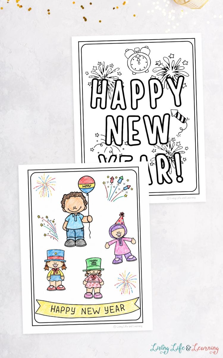 two New Year Coloring Pages on a table