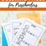 Three Human Body Coloring Pages for Preschoolers on a table