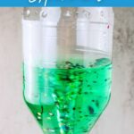 a photo of Tornado in a Bottle Experiment