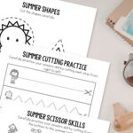 three Summer Cutting Worksheets on a table